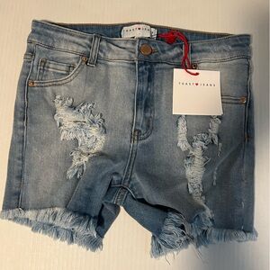 Women’s Toast Jeans distressed with frayed edges . Size L